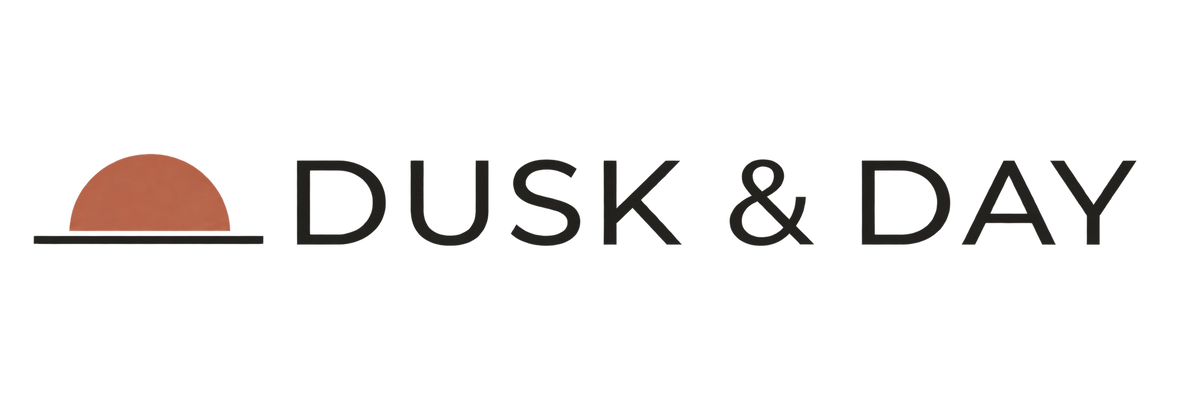 Dusk & Day — rising sun logo